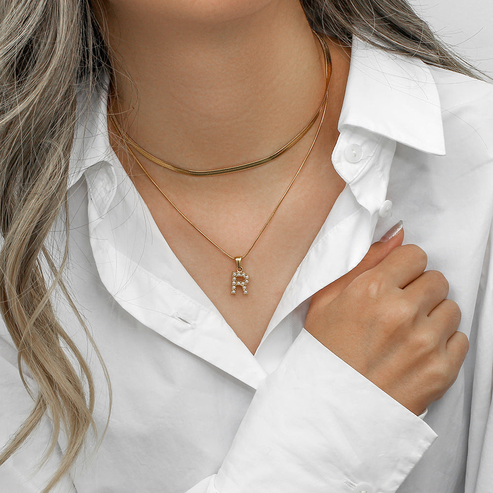 Fiona Kihtne Gold Initial Necklace